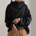 JO | Black sweater with oversized round neckline