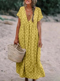 KS | Casual dress in printed fabric with a V-neckline and long sleeves