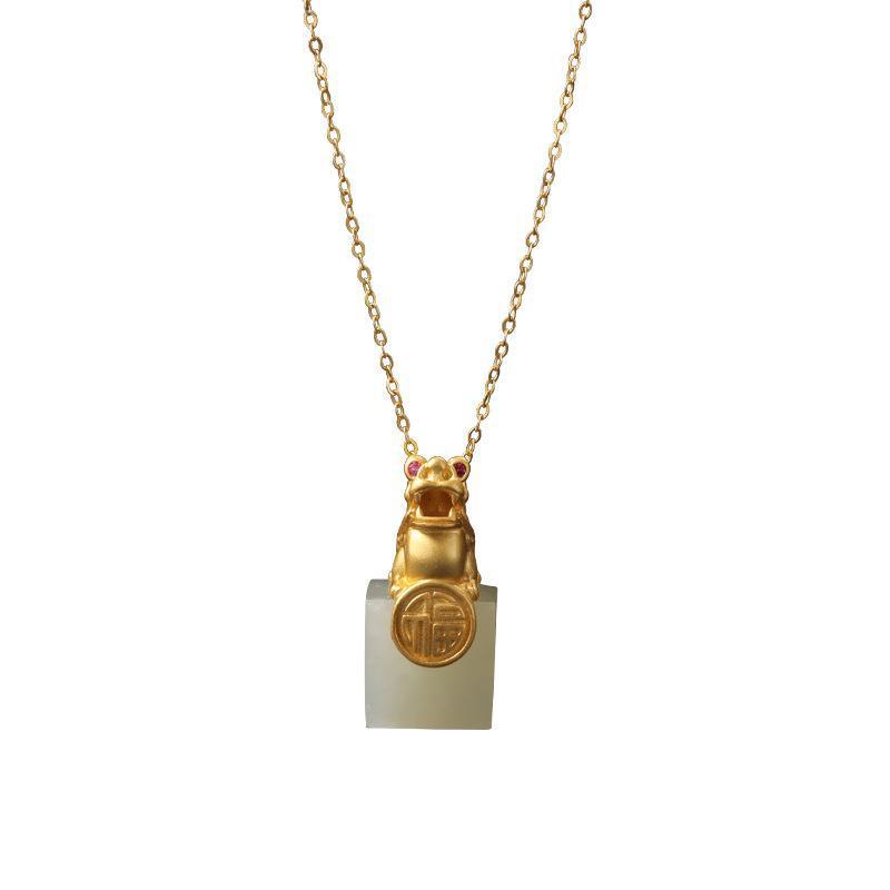 Delicate Artisan Gold Pendant